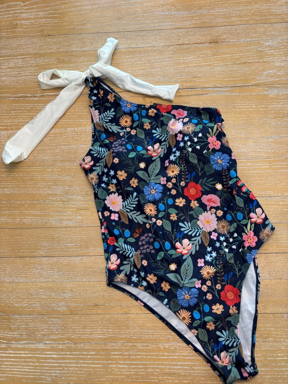 One-Shoulder Floral Women’s Swimsuit in Navy with White Bow